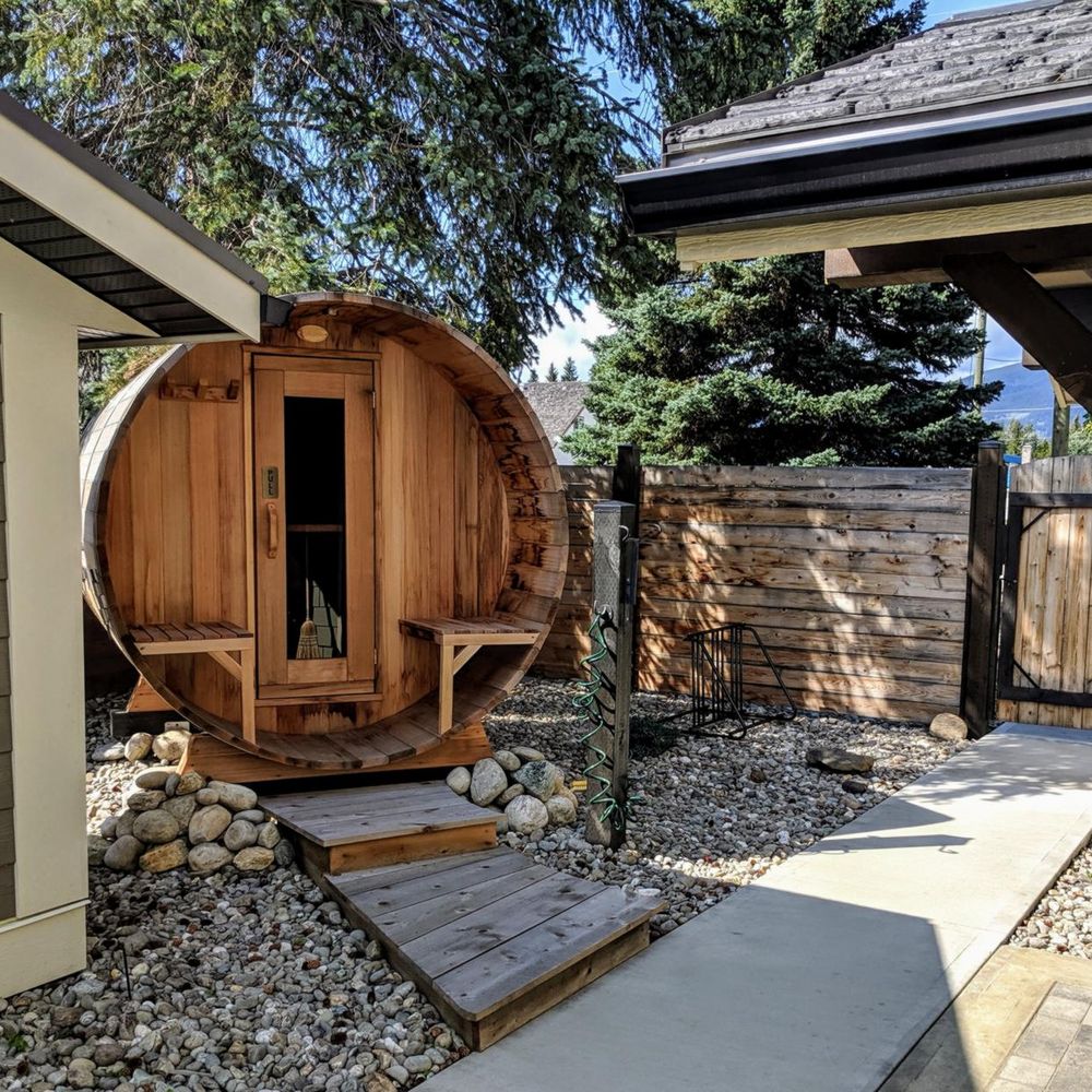 Enjoy the six-person cedar barrel sauna right outside your door.