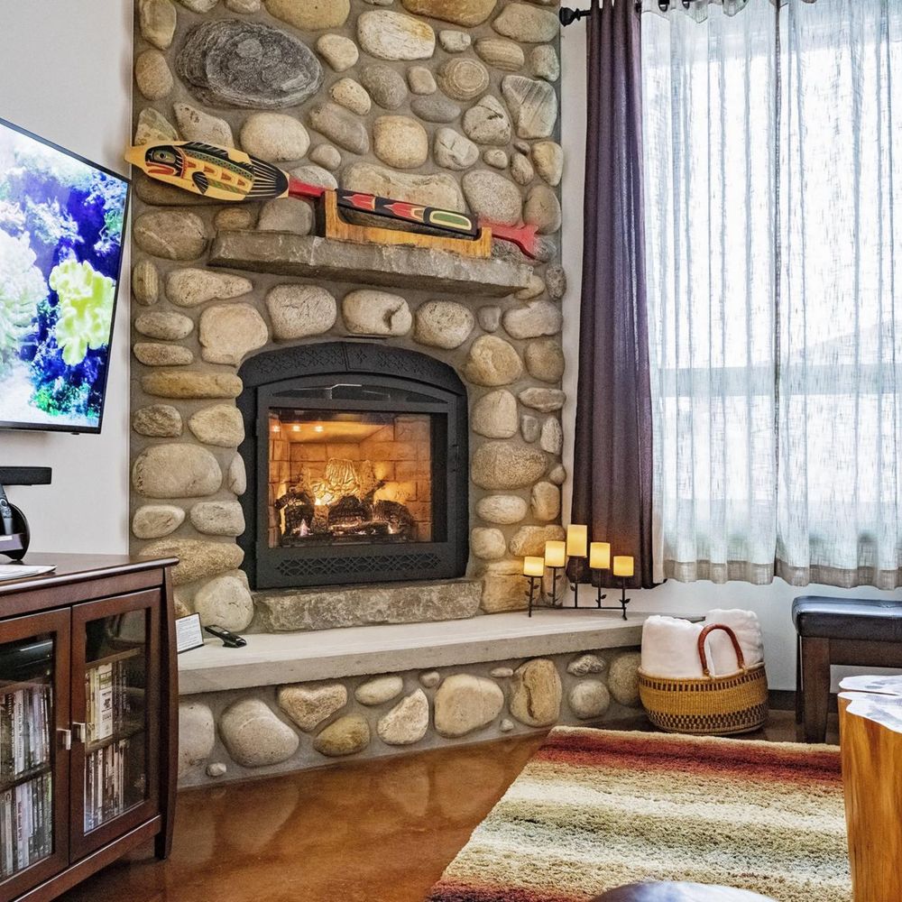 Grab a book or a drink (or both) and relax in front of the fireplace.